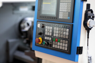 CNC control panel of industrial turning machine © gen_A