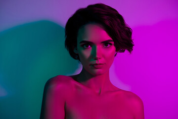 Fototapeta premium Photo of attractive girl look feel isolated gradient multicolor neon background