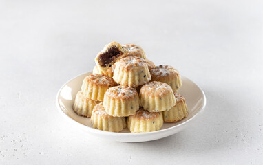 Arabic oriental cookies dates maamoul eid al fitr on a white background. Copy space.