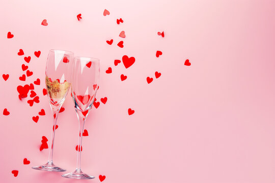 Romantic celebration with champagne glasses, hearts, and sparkling toast of love for valentine couple - Powered by Adobe
