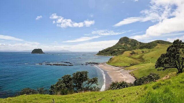 Fletcher Bay and its Rolling Hills along the remote Coromandel Coastal Walkway, Moehau Range, New Zealand