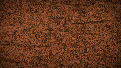 A textured background featuring earthy brown and dark tones with a grainy texture, perfect for natural-themed designs, wallpapers, and creative backdrops