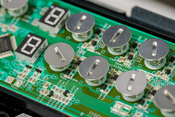 Exposed buttons on the induction plate.
