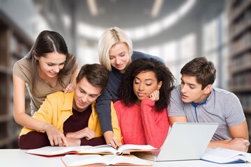 Happy students friends learning in library for education