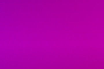 Grainy purple texture background fading from light to dark © Sergei