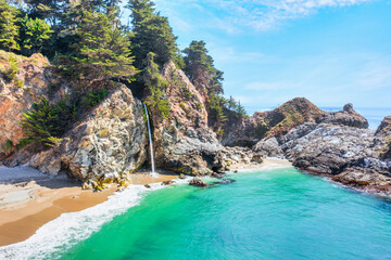 McWay Falls on Highway 1 and Big Sur along the Pacific Ocean coast, beautiful landscape and aerial view, sunset, sunrise, fog. Concept, travel, vacation, weekend