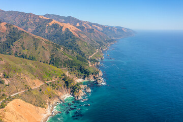 Beautiful landscape of Pacific Ocean coast along Highway 1 and Big Sur, aerial view, sunset, sunrise, fog. Concept, travel, vacation, weekend