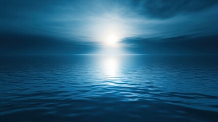 Obraz premium A beam of soft blue light casting a glowing reflection on water, creating a serene and peaceful atmosphere.