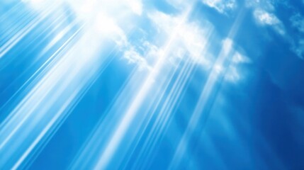 Fototapeta premium A bright azure blue background with light, sunray-like beams streaming diagonally across.