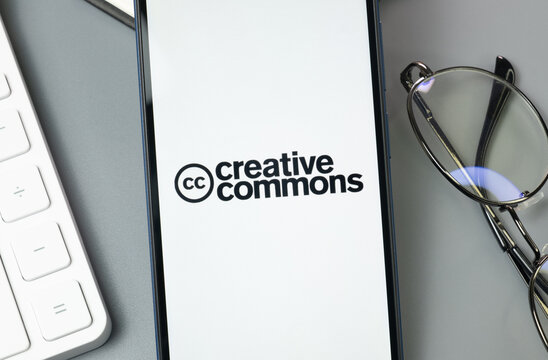 New York, USA - 30 August 2024: Creative Commons Logo on Phone Screen, Company Icon on Display