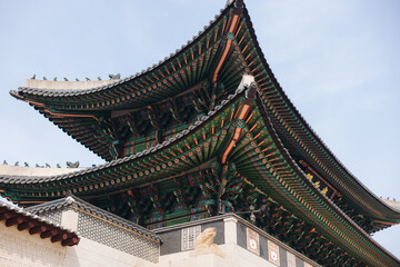 Fototapeta premium Gyeongbokgung Palace, Seoul, Jongno District, South Korea, in a spring sunny day, exterior view of main Korean royal palace with Gwanghwamun Gate, travel to Republic of Korea