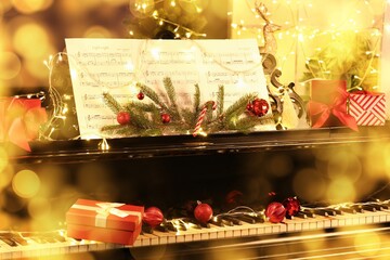 Christmas balls and gifts on piano