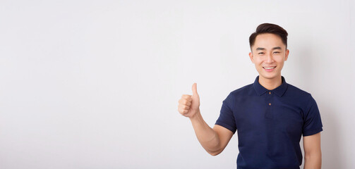 A portrait of a smiling Asian man wearing a navy blue polo shirt.