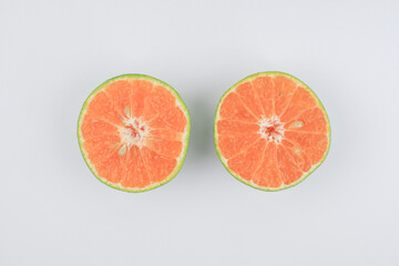 Fresh orange fruit with sliced on white background. Fresh summer fruit high vitamin C. Refresh drink.