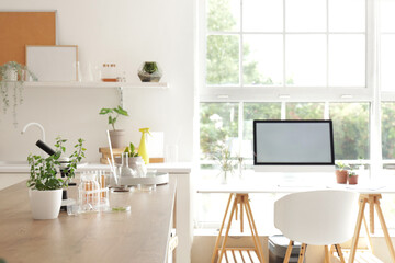Interior of laboratory with workplace and plants