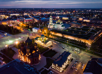 Fototapeta premium Night aerial view of Tula cityscape overlooking medieval Kremlin and Holy Assumption Cathedral, Russia