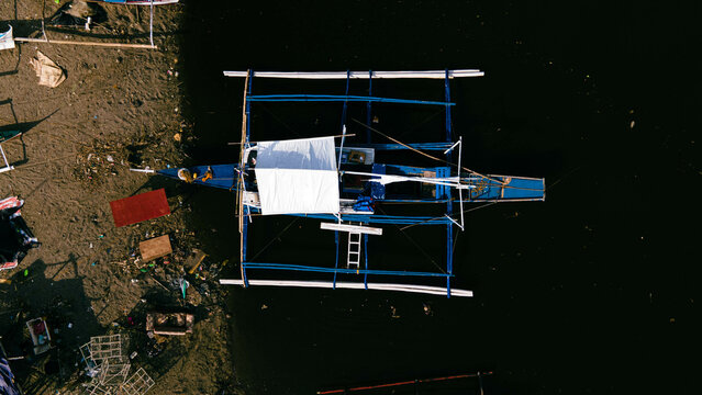 Boats and fishermen at the maragondon river cavite