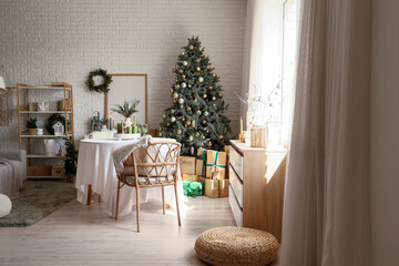 Interior of dining room with table, Christmas tree and presents