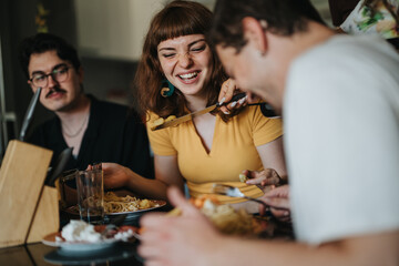 A group of happy friends shares a fun dining experience at home, laughing and enjoying each other's company during a casual meal. Capturing moments of togetherness and joy.