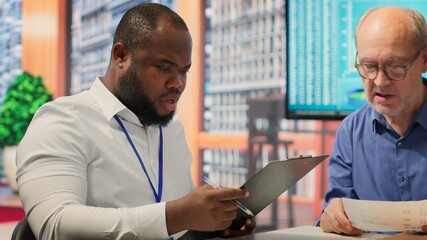 Old man and woman in a detailed counseling session with a financial broker about retirement plan, exploring investment strategy to increase life savings. Advisor with expertise. Camera A.