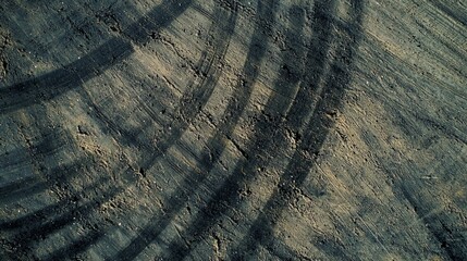 Fototapeta premium Tire track mark on asphalt tarmac road race track texture and background, Abstract background black tire tracks skid on asphalt road in racing circuit, Tire mark skid mark on asphalt road