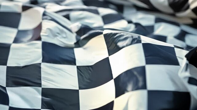 Waving checkered flag symbolizing competition, speed, and victory in racing. Evokes energy and motion, perfect for fast paced success