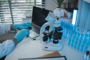 working atmosphere in the laboratory, chemistry and science specialist working in a lab with...