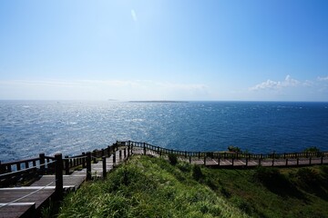 Obraz premium fine seaside walkway and far island