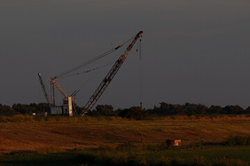 Old crane on a river
