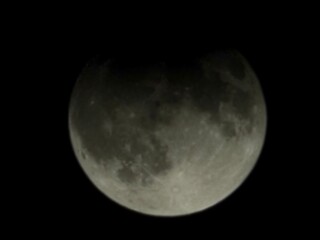Fototapeta premium moon partial eclipse iowa 2024