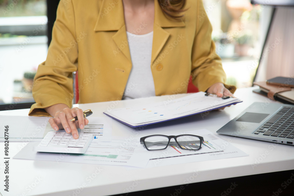 Wall mural business finance woman calculating budget numbers, invoices and financial adviser working.