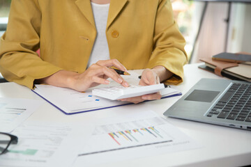 Business finance woman calculating budget numbers, Invoices and financial adviser working.