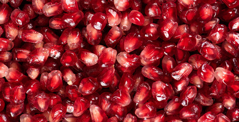 close up of pomegranate seeds texture background.