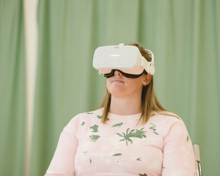 Female Athlete Uses Virtual Reality Headset for Training in a Modern Indoor Setting