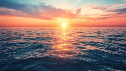 Obraz premium Beauty unfolds as the sun melts into the quiet sea.