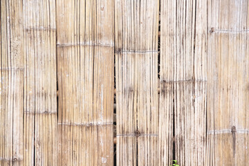Light brown old bamboo wooden wall fence rustic on background