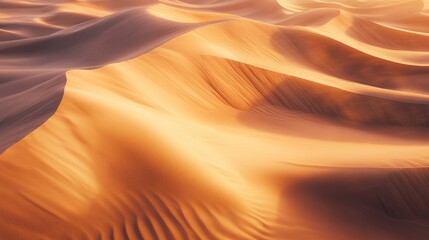 A drone flies over a remote desert landscape, photographing endless sand dunes shaped by the wind