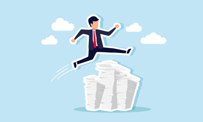 A businessman running and jumping over a stack of papers or workload, illustrating the step-by-step completion of tasks and responsibilities