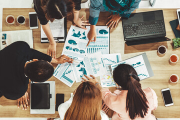 Top view of businessman executive in group meeting with other businessmen and businesswomen in...