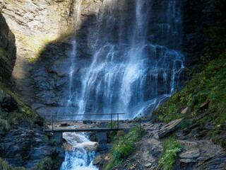 Waterfall crossed by a bridge Gorgas de Alba, Benasque, Arag&oacute;n, Spain
