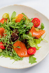 salad with tomatoes and salmon