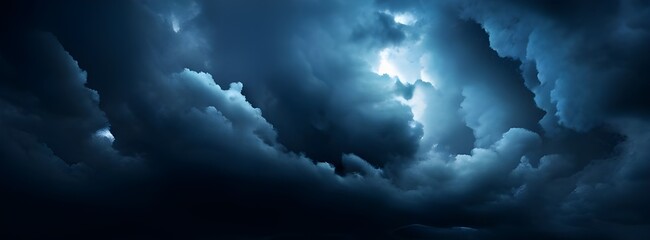Naklejka premium Dark and moody clouds covering the sky in a dramatic cloudscape background, stormy, overcast, weather, atmospheric, dramatic