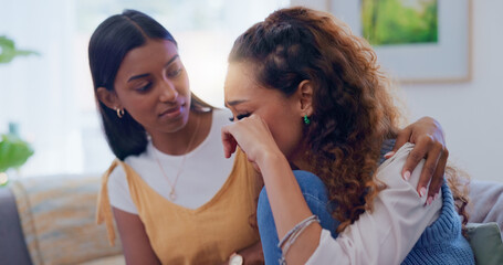 Women, friends and crying for consoling on sofa of breakup depression, relationship stress and...
