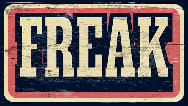 Aged and worn freak sign on wood
