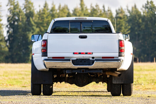Portland, OR, USA - Dec 8, 2023 - 2001 White Dodge Ram 3500 dually Cummins 24 Valve Turbo Diesel 4x4  off-road American pickup truck exterior. High quality picture for download.