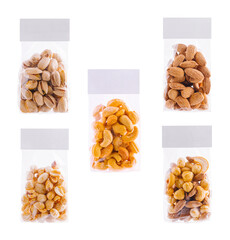 Different nuts and seeds packed in transparent bags with blank label for branding mockup