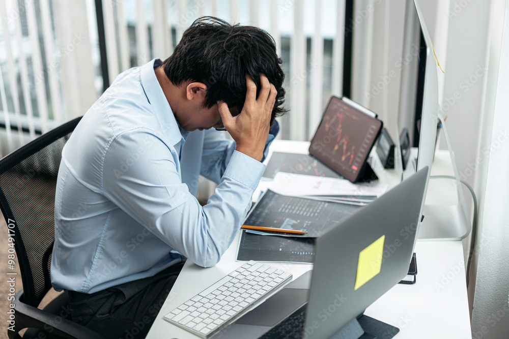 Poster businessman investor working and stress with computer analyzing graph stock market trading planning 