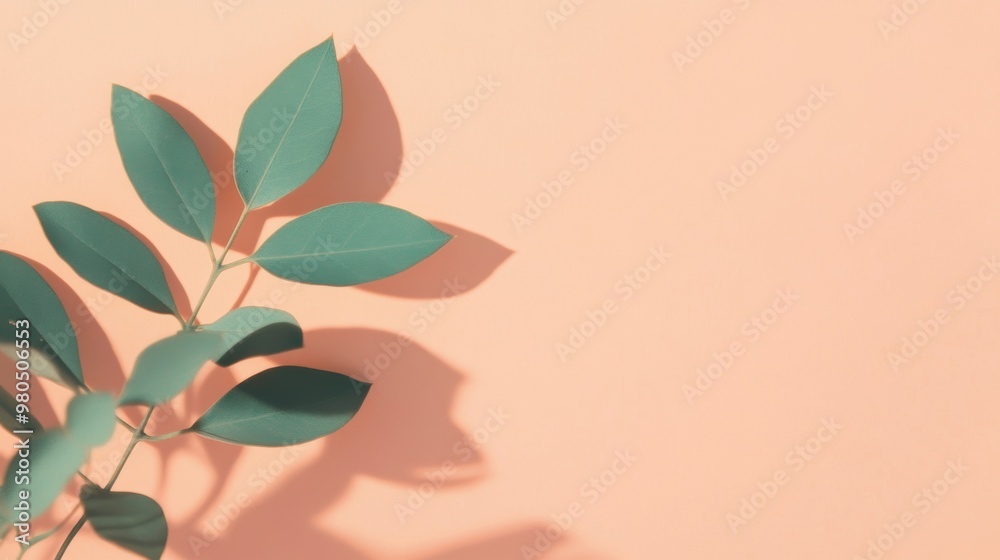 Poster delicate shadows from green leaves dance on a soft peach background, creating a calm and elegant min