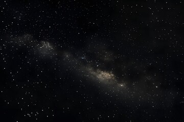 Naklejka premium A dark night sky with stars and the Milky Way galaxy in view. 