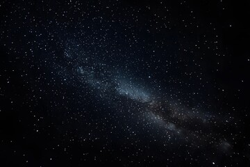 Fototapeta premium A dark night sky with stars and the Milky Way galaxy in view. 